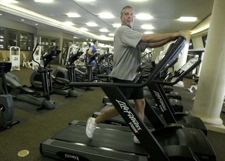 Randy Goldberg works out inside the exercise room of The Stirling Club at Turnberry Place on Monday, May 17, 2004. The exercise room is one of several amenities offered at the high-rise condominium. 